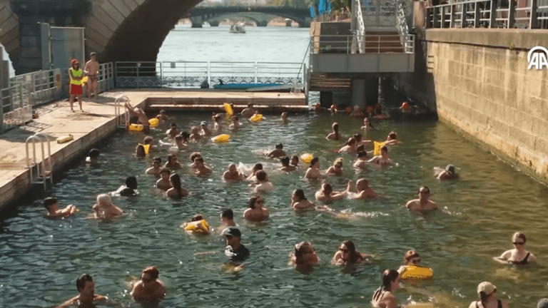 France Sizzles: Tour de France Route Shortened by 30 km, Parisians Jump into Seine River